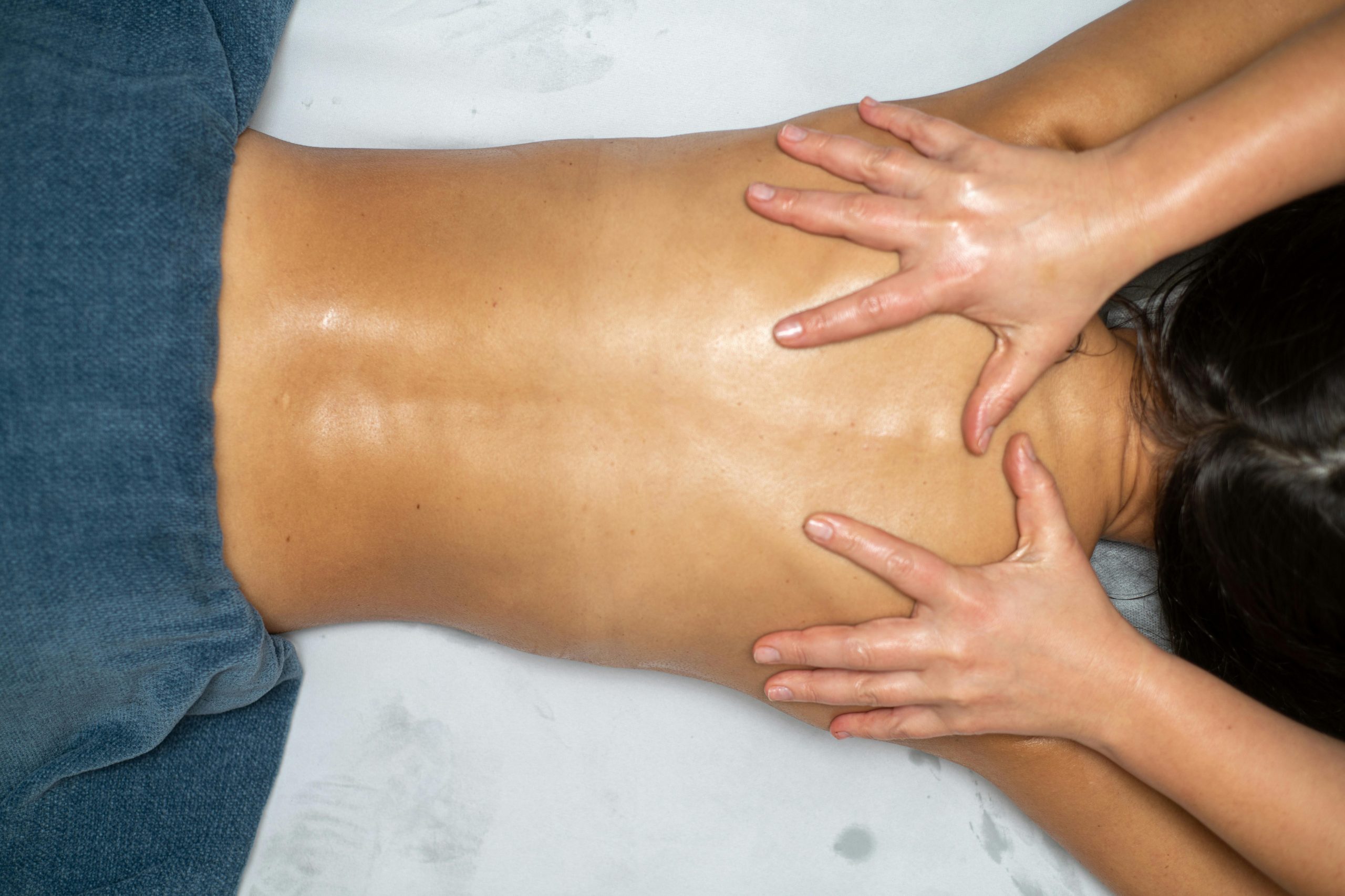 Professional massage technique for relaxing and soothing muscles.